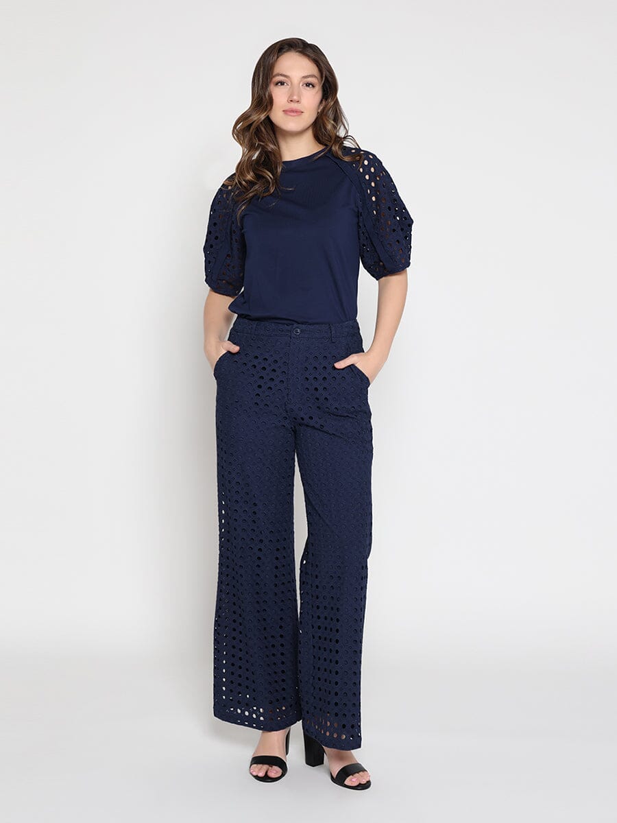 Eyelet sleeve and solid body crew neck top